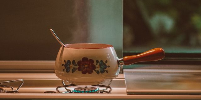 A pot standing on the gas stove. 