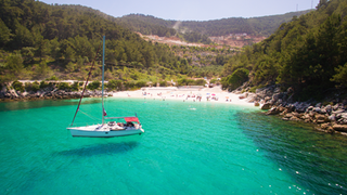 Thasos - beach, sea and sailboat